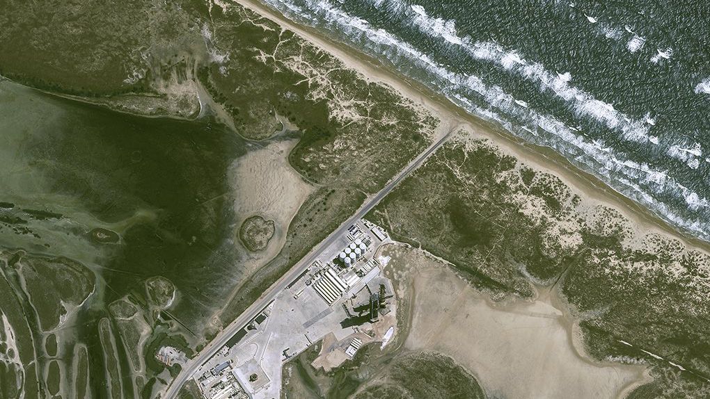 Starship ahead of its debut launch attempt seen by Airbus' Pleiades Neo satellite.