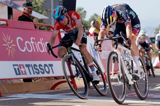 Team Bora's Primoz Roglic (R) and Team Lotto's Lennert Van Eetvelt sprint to cross the finish line in first and second place respectively, at the end of the stage 4 of La Vuelta a Espana cycling tour, a 170.4 km race between Plasencia and Pico Villuercas, near the town of Navezuelas in Caceres province, on August 20, 2024. (Photo by OSCAR DEL POZO / AFP)