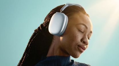 Apple AirPods Max 2 worn by woman with light coming from the top right (adapted using generative AI)