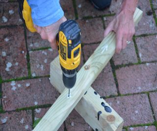 Drilling guiding holes in a wooden trellis batten