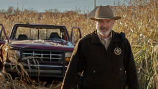 Sam Neill's Sheriff Tyson examines a crop circle in Apple's Invasion TV show