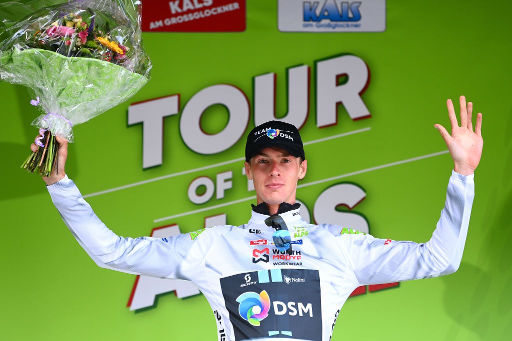 LIENZ AUSTRIA APRIL 21 Thymen Arensman of Netherlands and Team DSM celebrates winning the white best young jersey on the podium ceremony after the 45th Tour of the Alps 2022 Stage 4 a 1424km stage from Villabassa to Kals am Grossglockner 1336m TouroftheAlps on April 21 2022 in Lienz Austria Photo by Tim de WaeleGetty Images