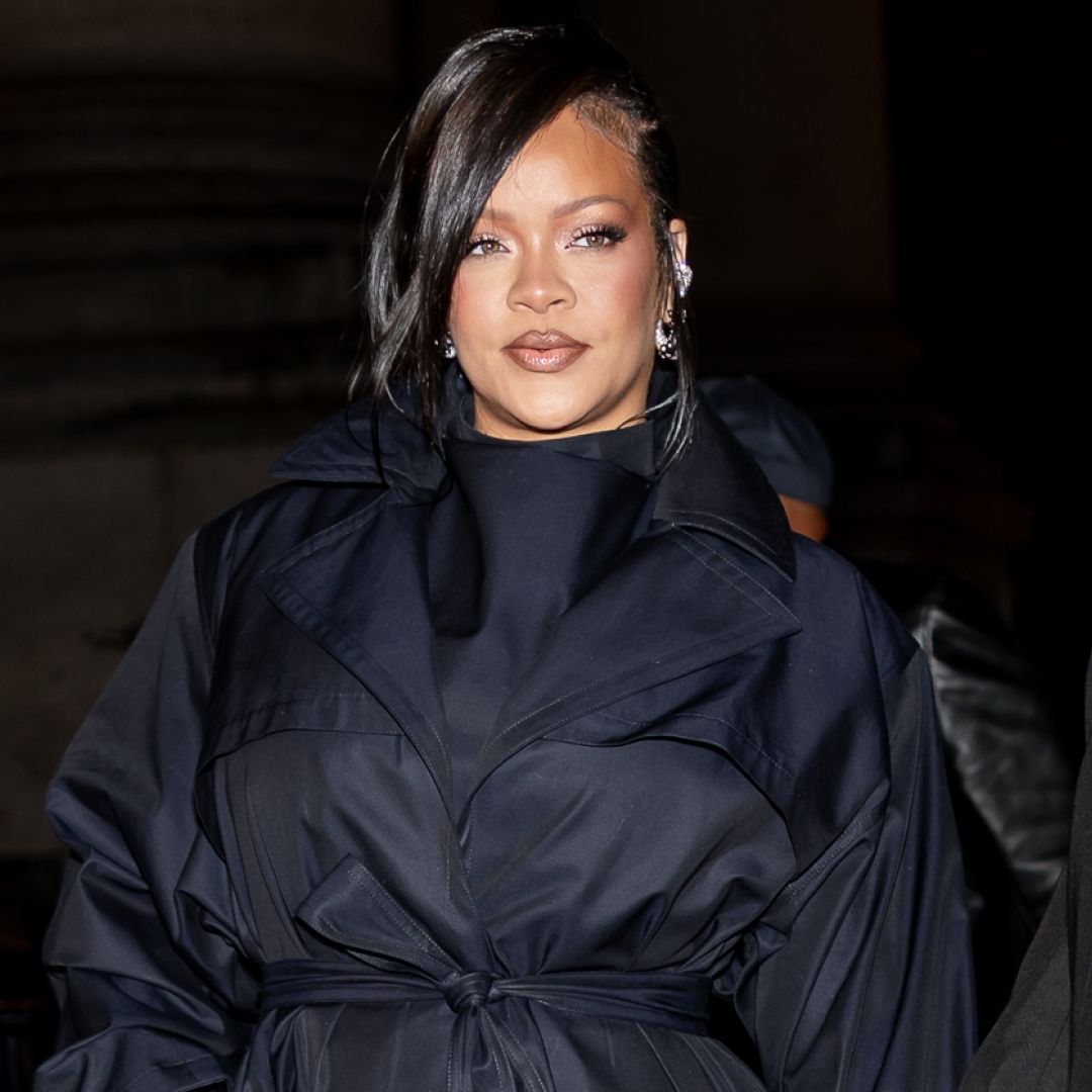 Rihanna was spotted in baggy jeans, statement sneakers, and a shawl, creating her latest high-low look