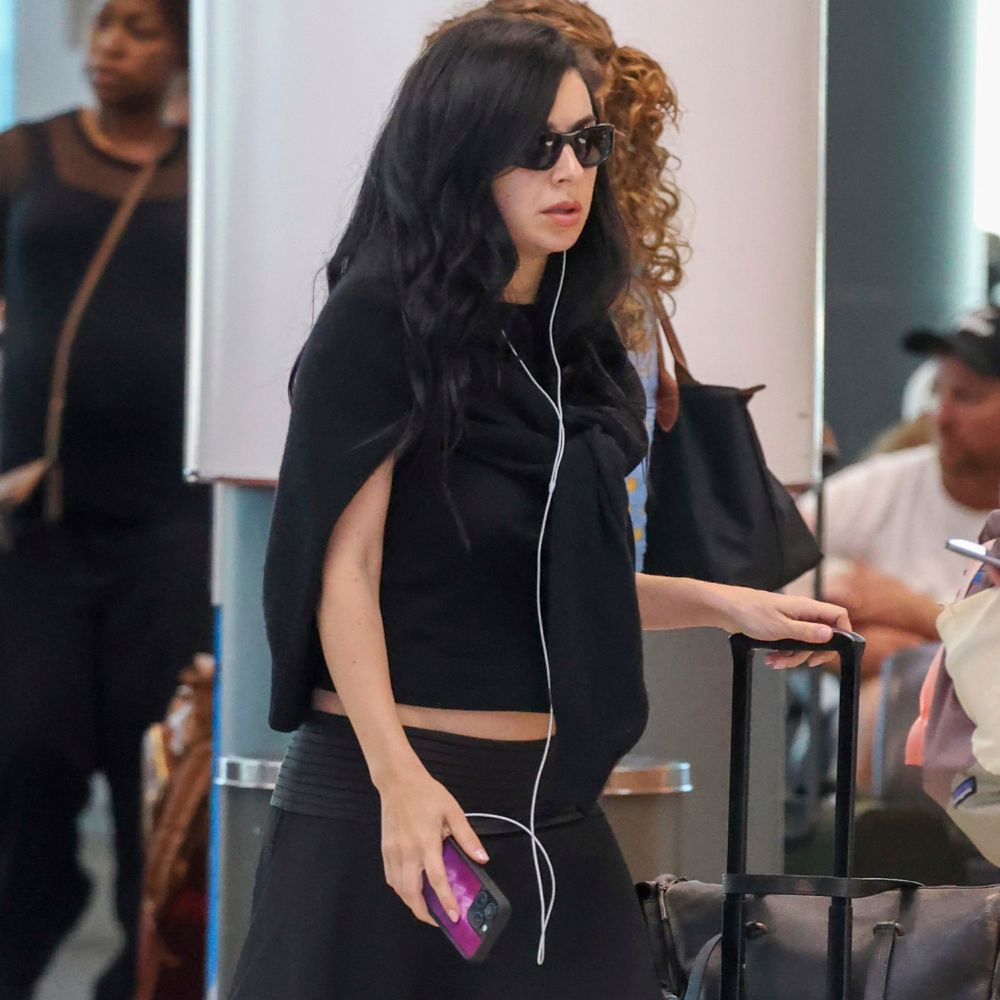 Charli XCX Arrived at the Airport In the One Shoe Trend I'd Never Wear Through Security