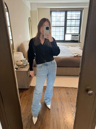 Nikki wears straight-leg jeans from H&M