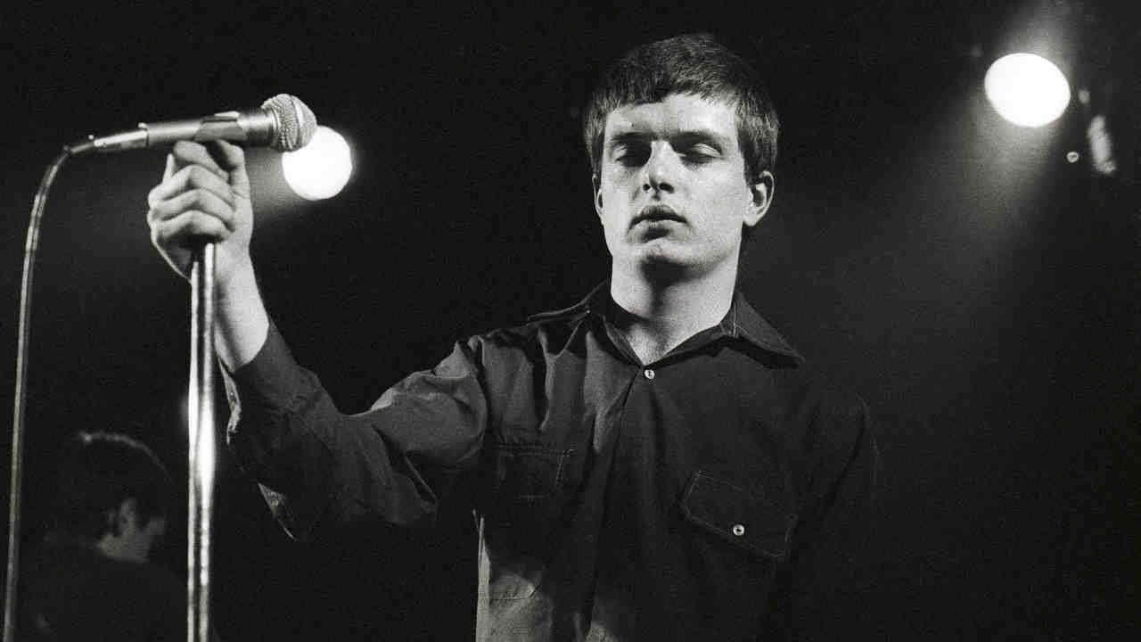 Joy DIvision performing onstage in 1980