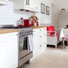 kitchen unit with red cushion and white drawer