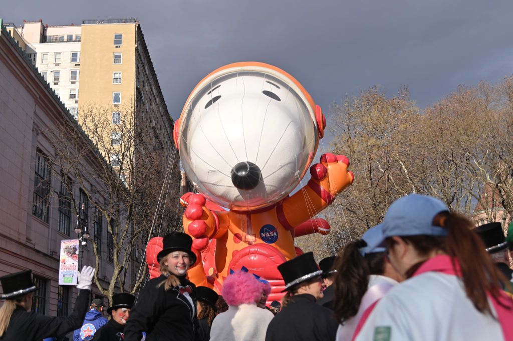 The Astronaut Snoopy balloon is prepared to float down the parade route during the 93rd Annual Macy&amp;#039;s Thanksgiving Day Paade on November 28, 2019 in New York City.