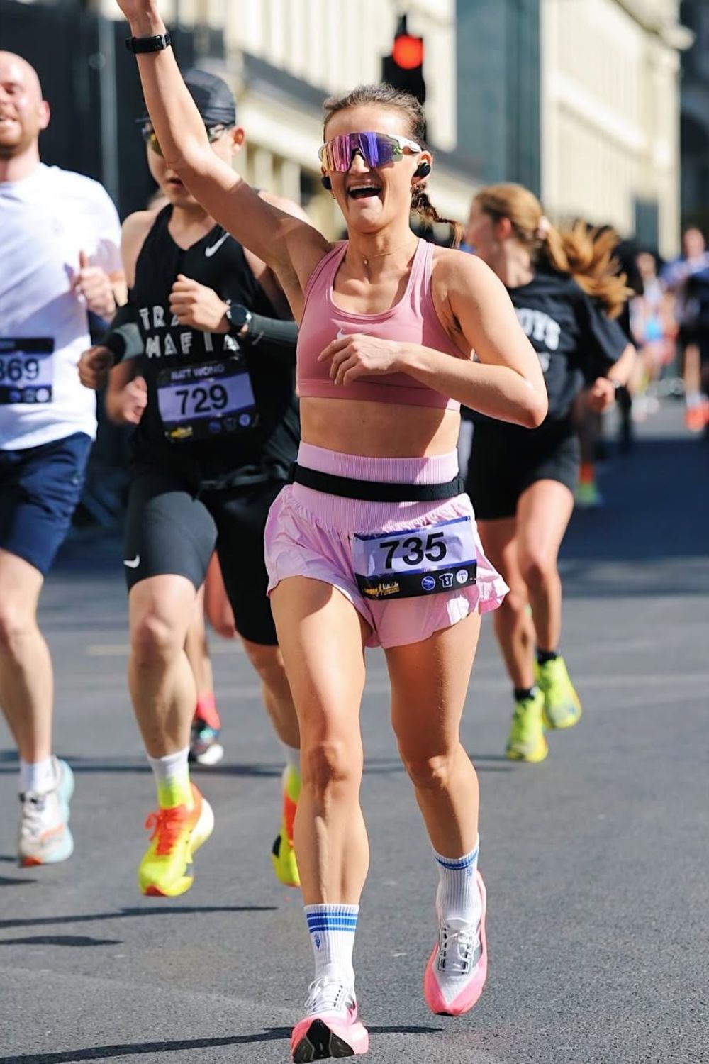 ally head wearing a pair of the best running sunglasses