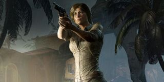 Lara Croft holding a pistol in Shadow of the Tomb Raider