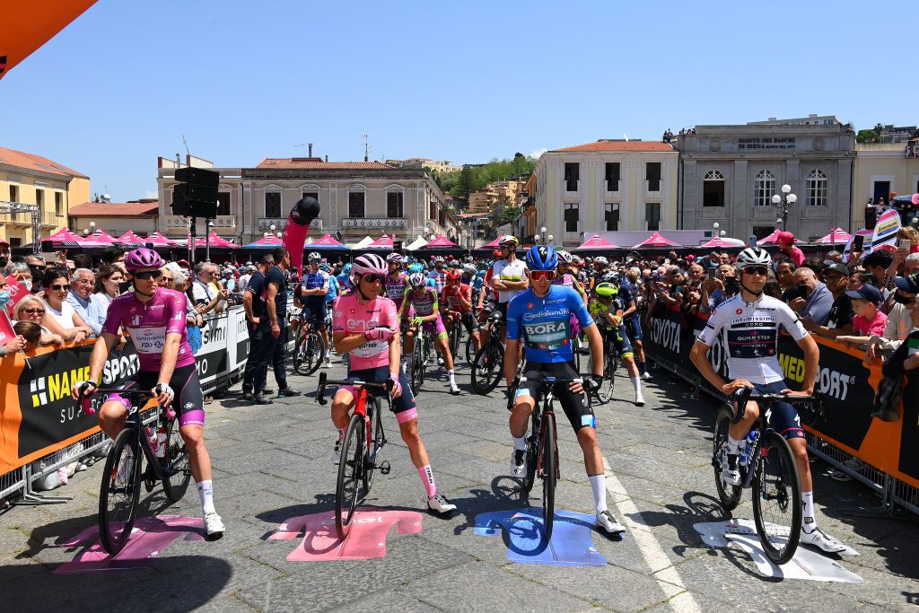 SCALEA ITALY MAY 12 LR Arnaud Demare of France and Team Groupama FDJ Purple Points Jersey Juan Pedro Lpez of Spain and Team Trek Segafredo Pink Leader Jersey Lennard Kmna of Germany and Team Bora Hansgrohe Blue Mountain Jersey and Mauri Vansevenant of Belgium and Team QuickStep Alpha Vinyl White Best Young Rider Jersey prior to the 105th Giro dItalia 2022 Stage 6 a 192km stage from Palmi to Scalea Giro WorldTour on May 12 2022 in Scalea Italy Photo by Tim de WaeleGetty Images