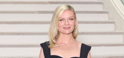kirsten dunst wearing a black top at chanel haute couture AW25/26