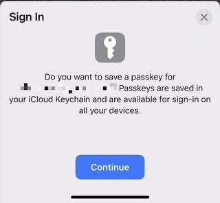 A pop-up window in iOS 16 asking if a user wants to save a passkey to their iCloud Keychain.