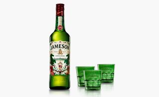 The Jameson limited edition bottle with green glasses