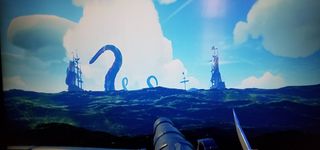 Sea of Thieves' Kraken attacking distant ships.