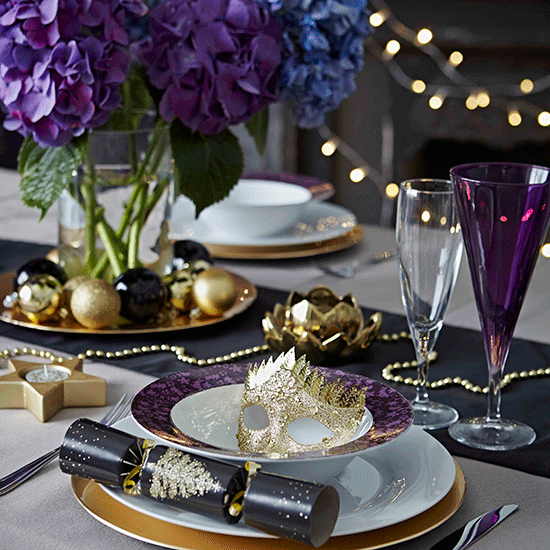 christmas table setting with purple and blue
