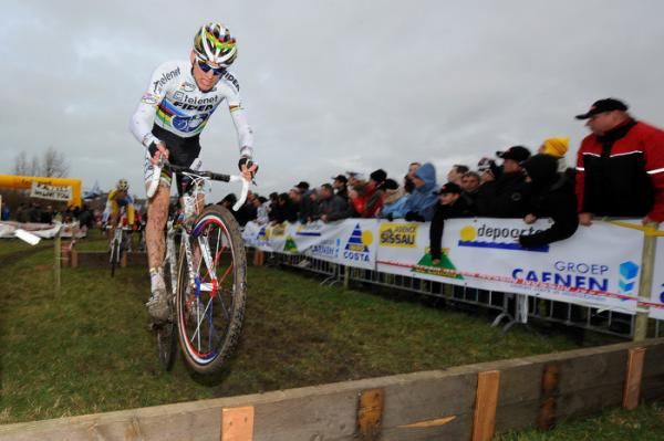 World champion Zdenek Stybar (Telenet - Fidea) bunnyhops a barrier.