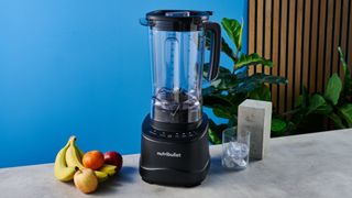 Nutribullet Power Core photographed in front of a blue background