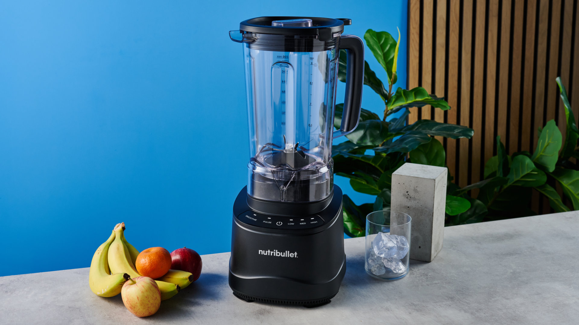 Nutribullet Power Core photographed in front of a blue background