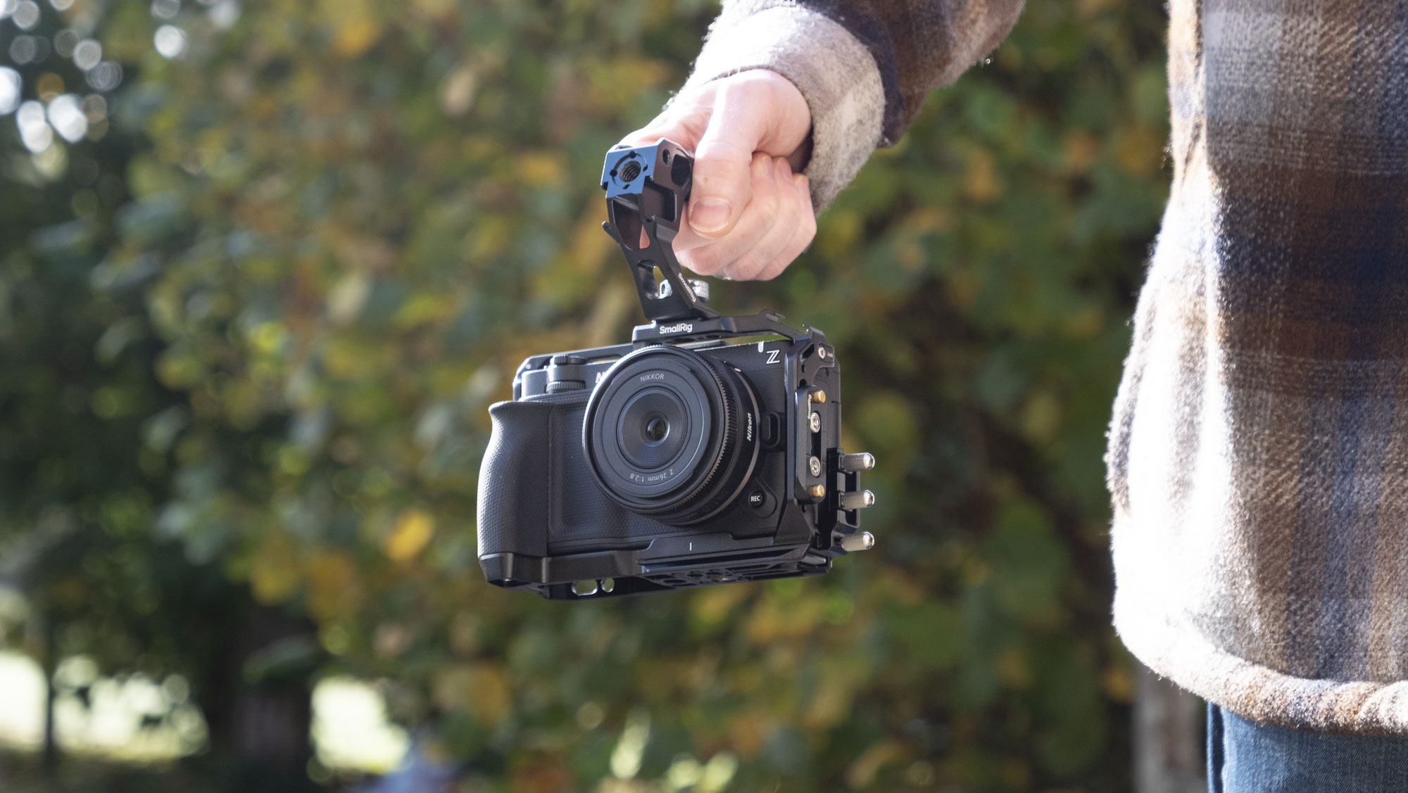 Nikon ZR product photos – inside a dedicated SmallRig cage, held by user