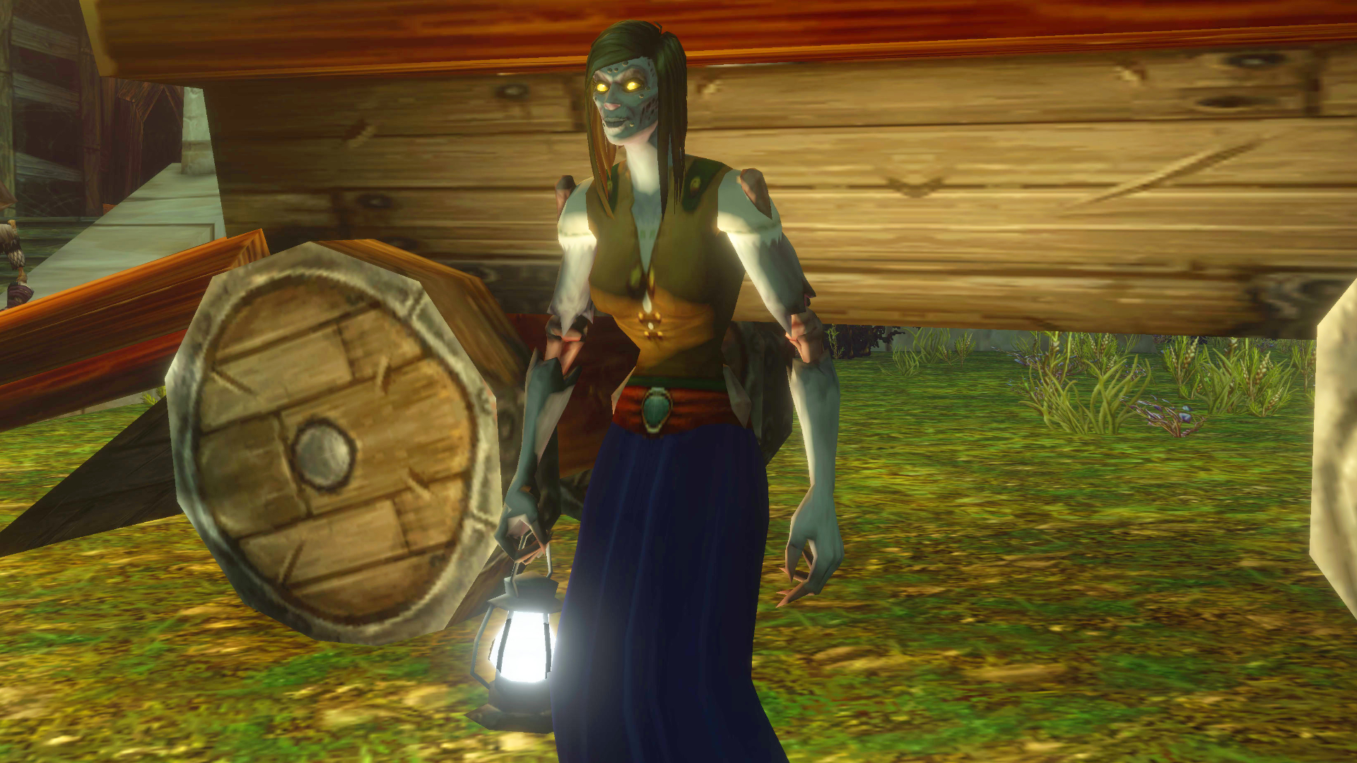 A screenshot of the World of Warcraft: Forever beta. An undead lady holds a glowing lantern while standing next to a wooden cart.
