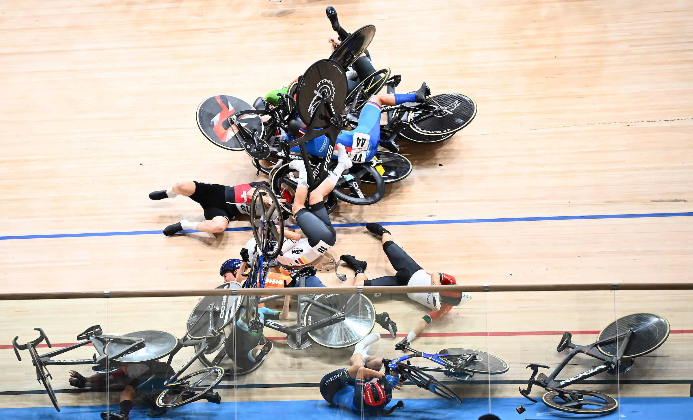 UCI Track World Championships - Chongming Shanghai Velodrome, Shanghai, China - Women's Omnium, Scratch Race 1/4 - Mass Pile up crash during the Women's Omnium Scratch Race
