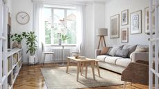 A modern Scandinavian style apartment living room with light furniture and framed wall art