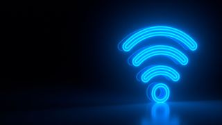 Futuristic glowing blue wi-fi symbol on black dark background with blurred reflection