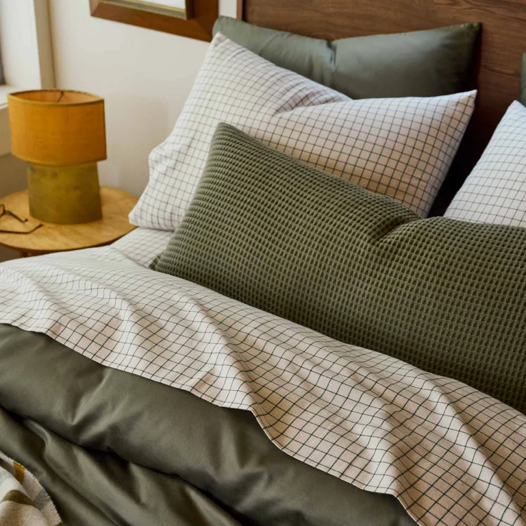 Green and white striped bedding