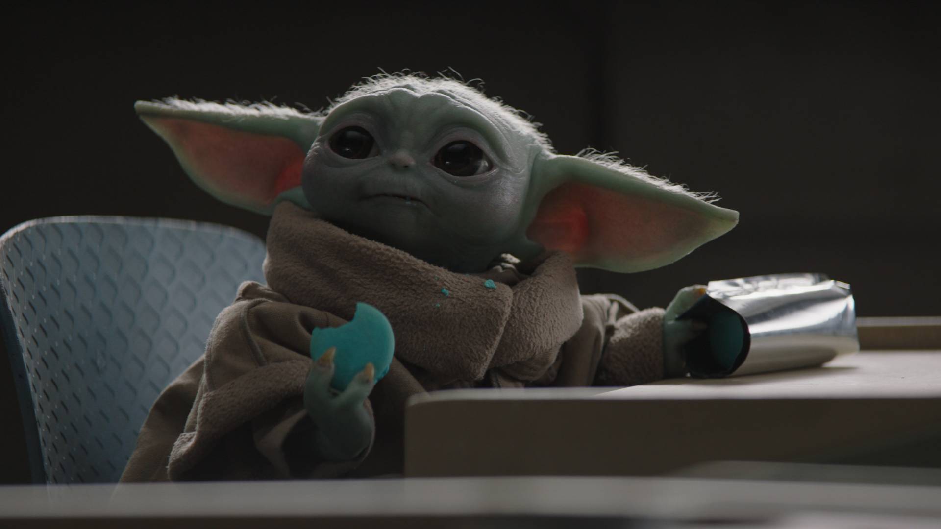 Grogu eating macarons in The Mandalorian season 2
