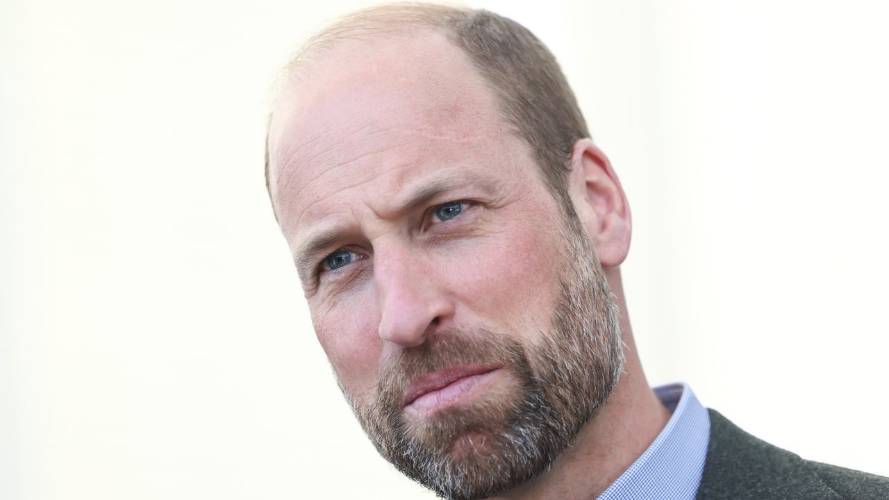 A headshot of Prince William looking serious