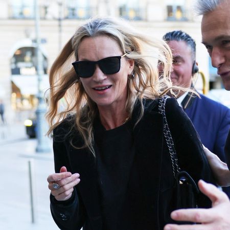 Kate Moss wearing a black and white outfit in Paris
