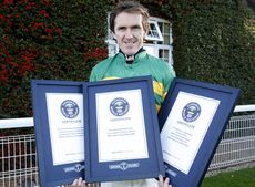 AP-McCoy-with-his-three-Guinness-World-Records.jpg