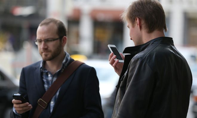 Men with cell phones