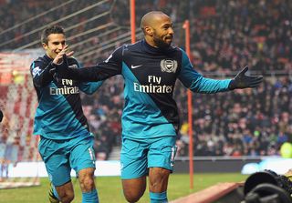 SUNDERLAND, ENGLAND - FEBRUARY 11: Thierry Henry (R) of Arsenal celebrates scoring to make it 2-1 with Robin van Persie during the Barclays Premier League match between Sunderland and Arsenal at the Stadium of Light on February 11, 2012 in Sunderland, England. (Photo by Michael Regan/Getty Images)