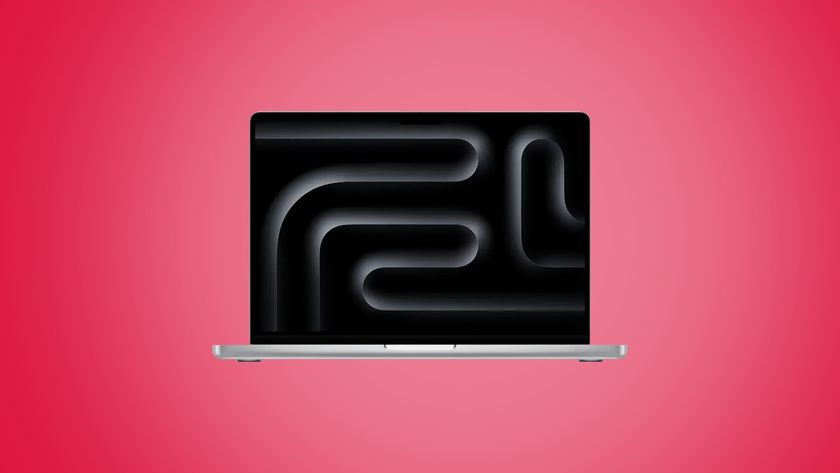 The Apple MacBook Pro on a reddish background. 