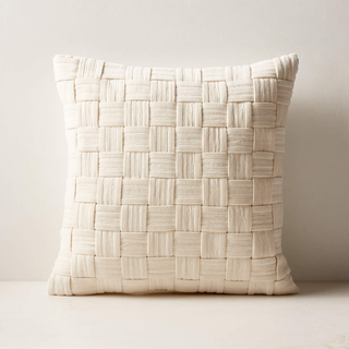 Textured woven throw pillow.