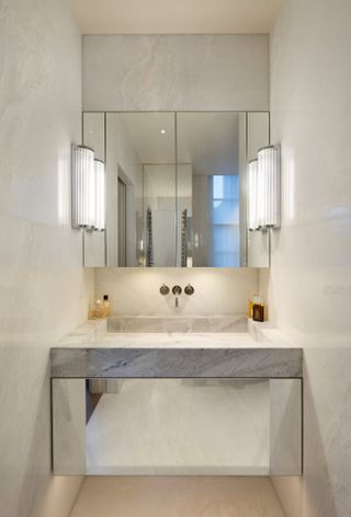 modern powder room with large mirror