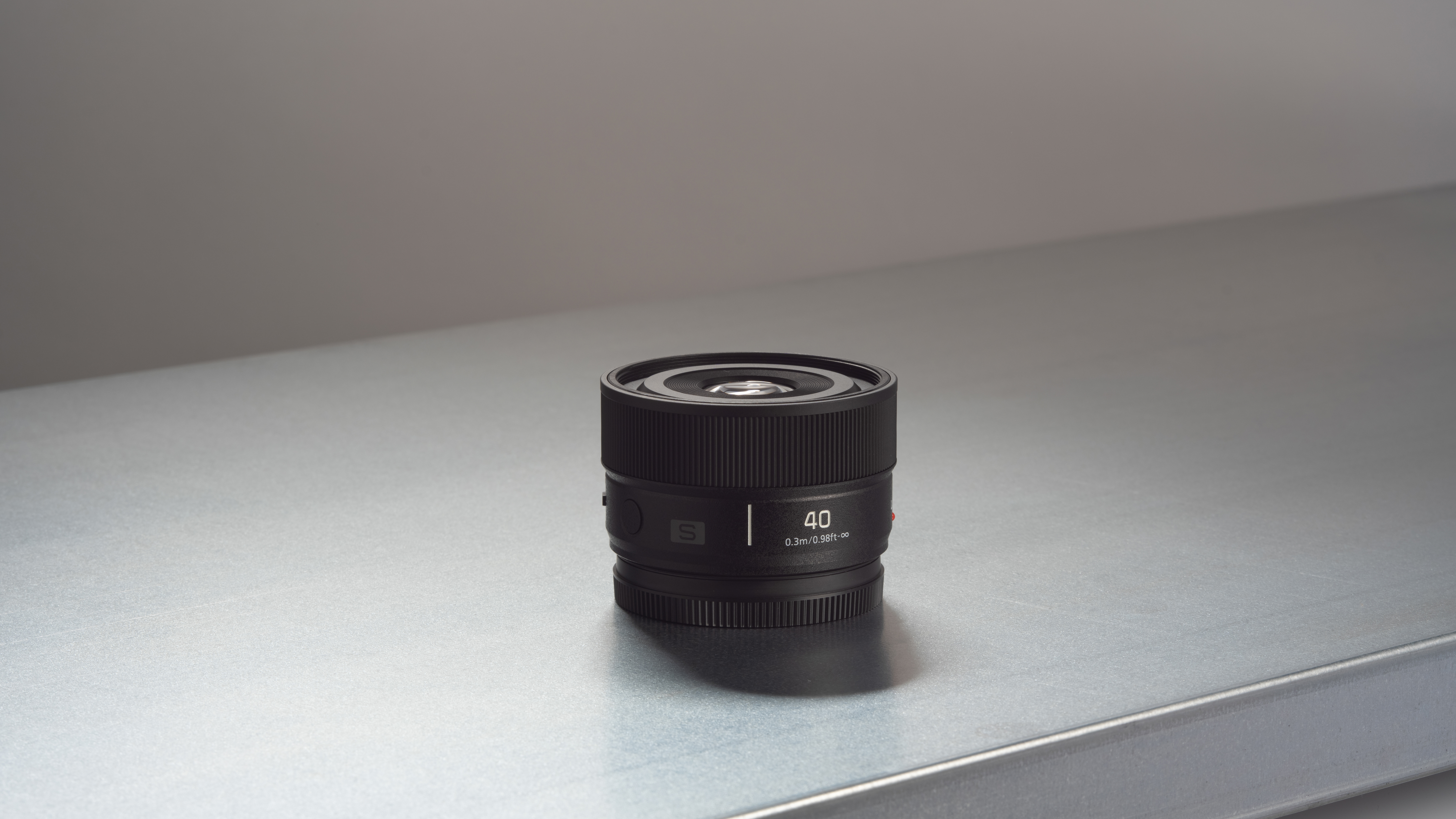 The Panasonic Lumix S 40mm f/2 lens on a table