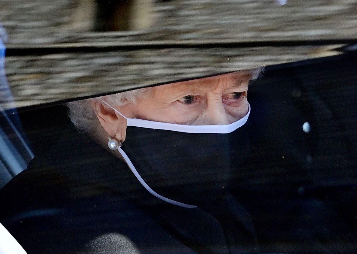 WINDSOR, UNITED KINGDOM - APRIL 17: (EMBARGOED FOR PUBLICATION IN UK NEWSPAPERS UNTIL 24 HOURS AFTER CREATE DATE AND TIME) Queen Elizabeth II travels (in her Bentley State Limousine) to attend the funeral of Prince Philip, Duke of Edinburgh at St. George&#039;s Chapel, Windsor Castle on April 17, 2021 in Windsor, England. Prince Philip of Greece and Denmark was born 10 June 1921, in Greece. He served in the British Royal Navy and fought in WWII. He married the then Princess Elizabeth on 20 November 1947 and was created Duke of Edinburgh, Earl of Merioneth, and Baron Greenwich by King VI. He served as Prince Consort to Queen Elizabeth II until his death on April 9 2021, months short of his 100th birthday. His funeral takes place today at Windsor Castle with only 30 guests invited due to Coronavirus pandemic restrictions. (Photo by Pool/Max Mumby/Getty Images)