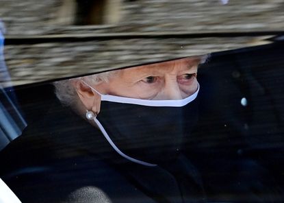 WINDSOR, UNITED KINGDOM - APRIL 17: (EMBARGOED FOR PUBLICATION IN UK NEWSPAPERS UNTIL 24 HOURS AFTER CREATE DATE AND TIME) Queen Elizabeth II travels (in her Bentley State Limousine) to attend the funeral of Prince Philip, Duke of Edinburgh at St. George's Chapel, Windsor Castle on April 17, 2021 in Windsor, England. Prince Philip of Greece and Denmark was born 10 June 1921, in Greece. He served in the British Royal Navy and fought in WWII. He married the then Princess Elizabeth on 20 November 1947 and was created Duke of Edinburgh, Earl of Merioneth, and Baron Greenwich by King VI. He served as Prince Consort to Queen Elizabeth II until his death on April 9 2021, months short of his 100th birthday. His funeral takes place today at Windsor Castle with only 30 guests invited due to Coronavirus pandemic restrictions. (Photo by Pool/Max Mumby/Getty Images)