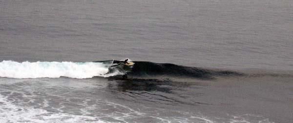 Mike Broderick enjoys a glassy morning session.