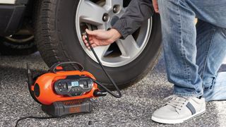 Black + Decker 20V Max Inflator used to inflate car tires