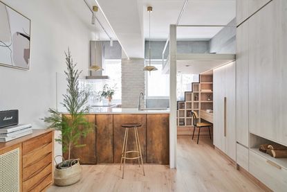 a micro apartment with a mezzanine