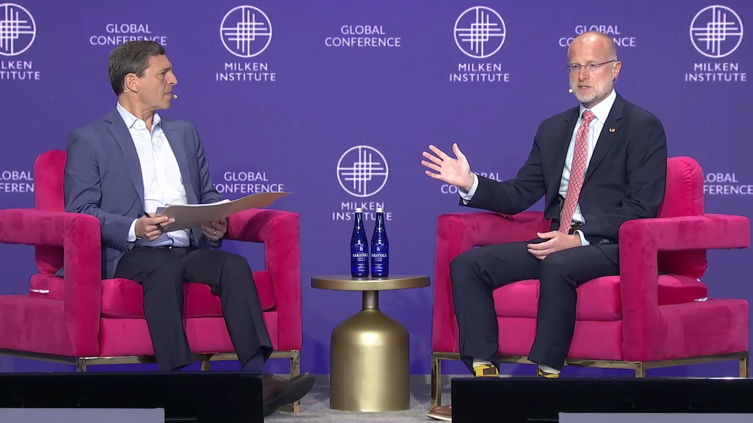 David Farber, anchor CNBC (left) and Brendan Carr, FCC chair at the Milken Institute.