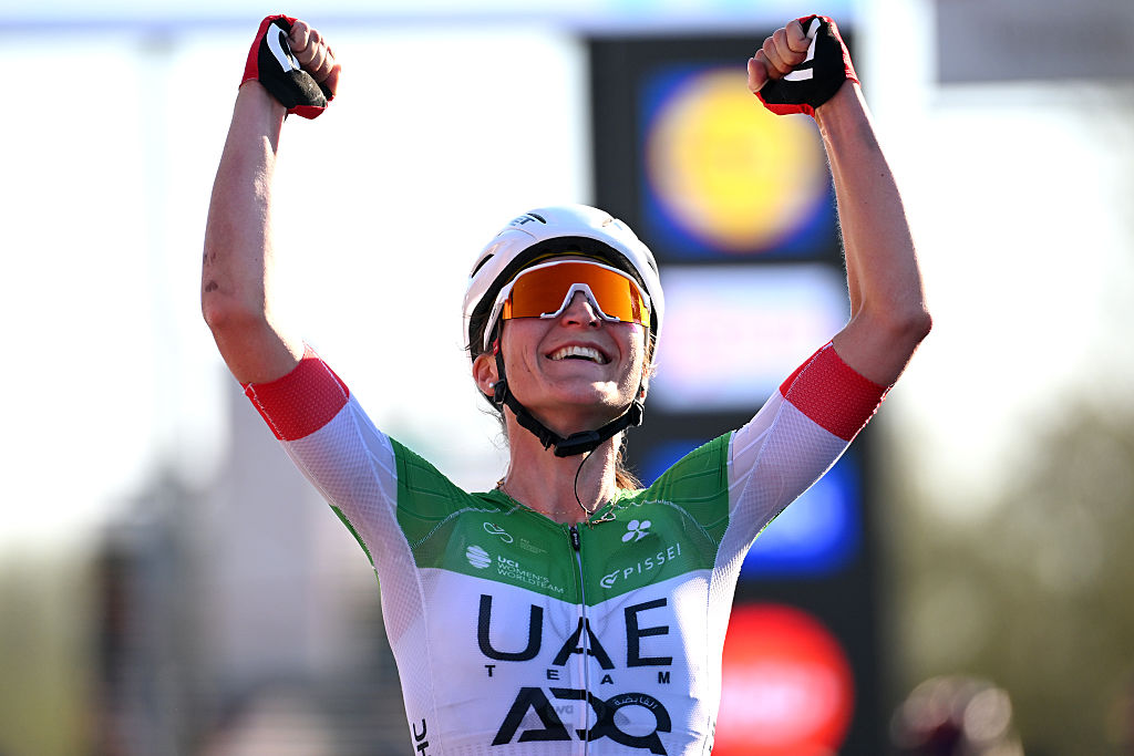 WAREGEM, BELGIUM - APRIL 02: Elisa Longo Borghini of Italy and UAE Team ADQ celebrates at finish line as race winner during the 13rd Dwars door Vlaanderen 2025 - Women&#039;s Elite a 128.5km one day race from Waregem to Waregem / #UCIWWT / on April 02, 2025 in Waregem, Belgium. (Photo by Tim de Waele/Getty Images)