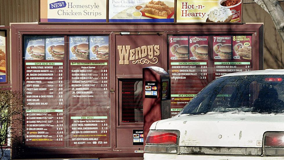 a car in a Wendy&#039;s drive through