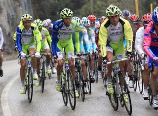 Ivan Basso (Liquigas-Cannondale) marshalled by his teammates.