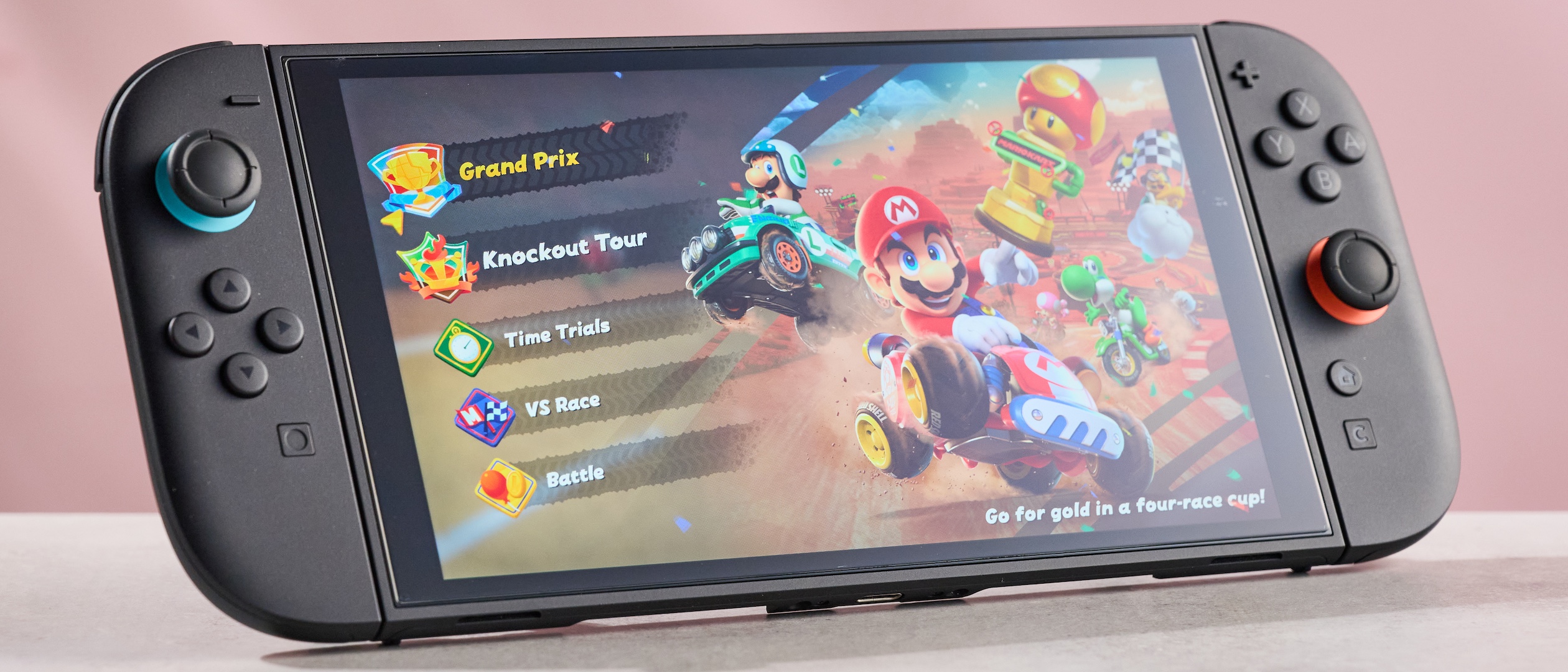 The Nintendo Switch 2 with the Belkin Tempered Glass Anti-Reflective Screen Protector applied; Mario Kart World is displayed on screen with bright, vibrant colors.