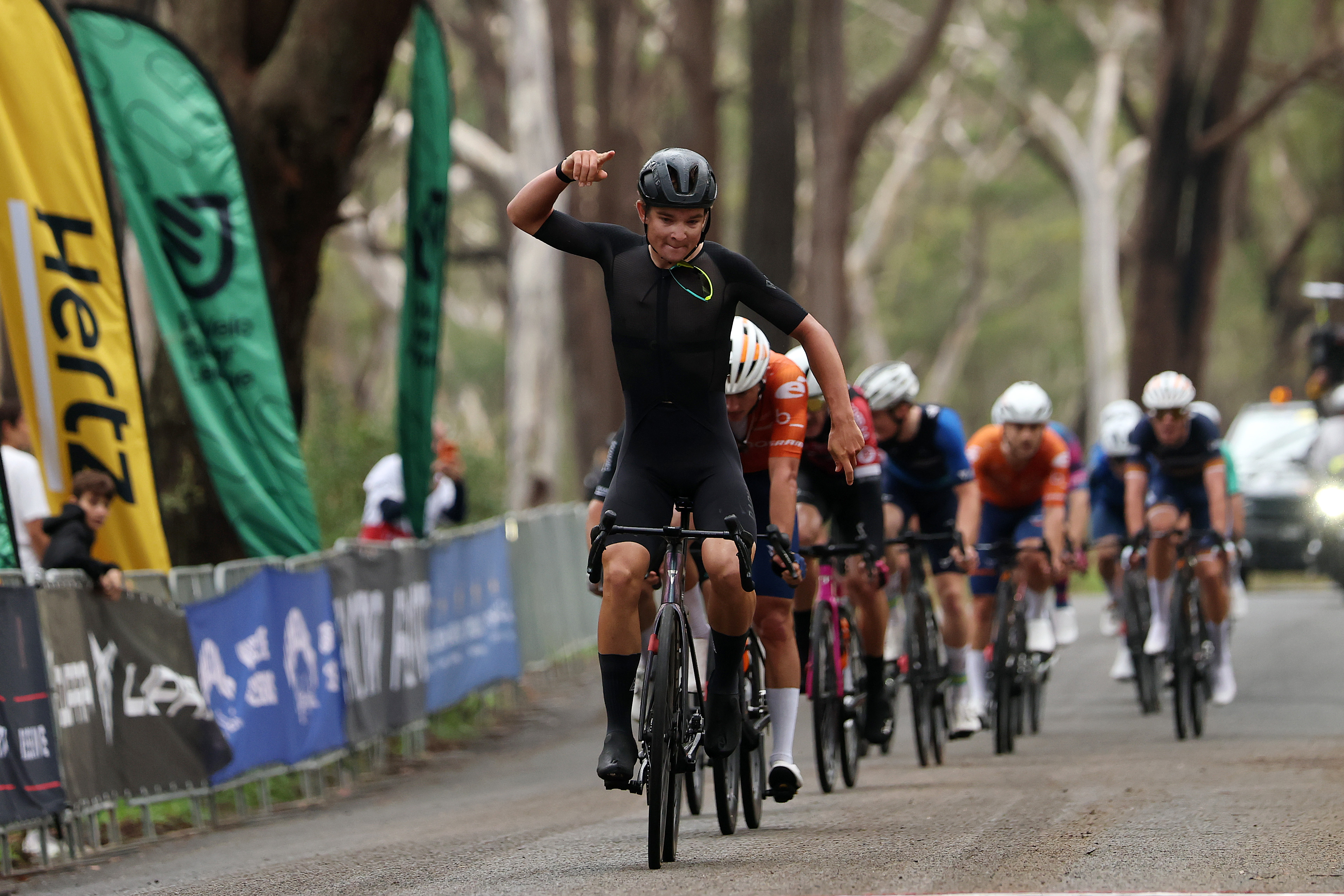 Will Heffernan celebrates the win on the final stage of the Harbour City GP, the fourth round of the 2026 ProVelo Super League